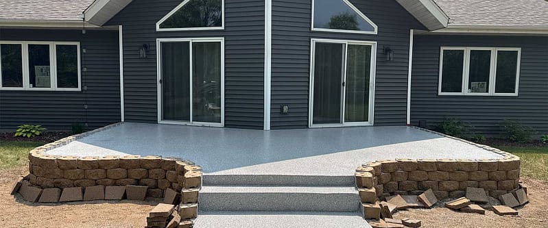 Patio at a home with an outdoor concrete coating.